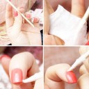 palillos naranjos de manicura